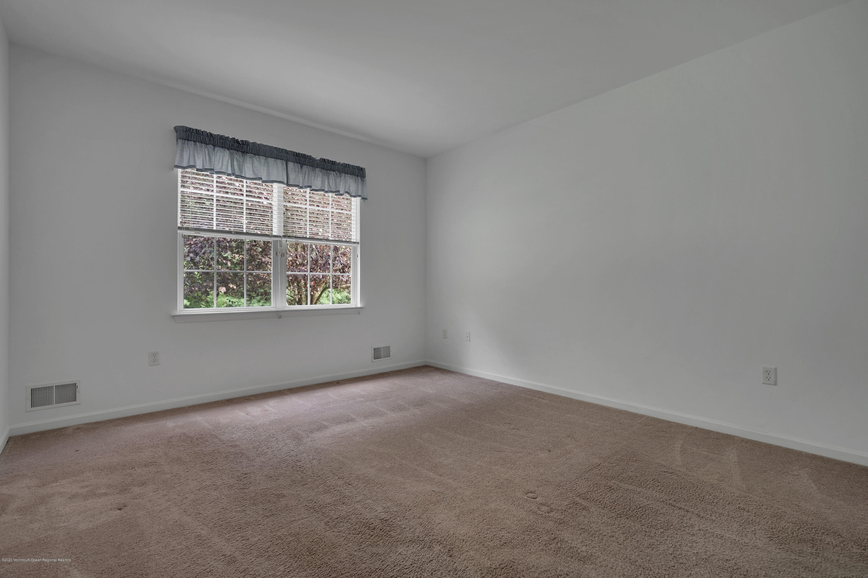 187 Wordsworth Road Brick, NJ 08724 - Photo 29 of 41 an empty room with a window