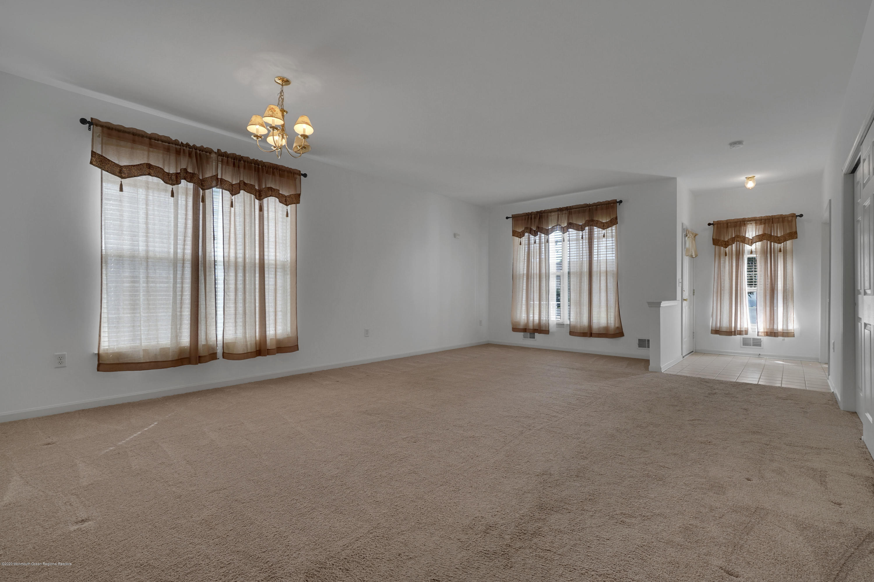 187 Wordsworth Road Brick, NJ 08724 - Photo 7 of 41 a view of an empty room with a window