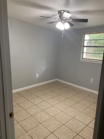 a view of a window in an empty room