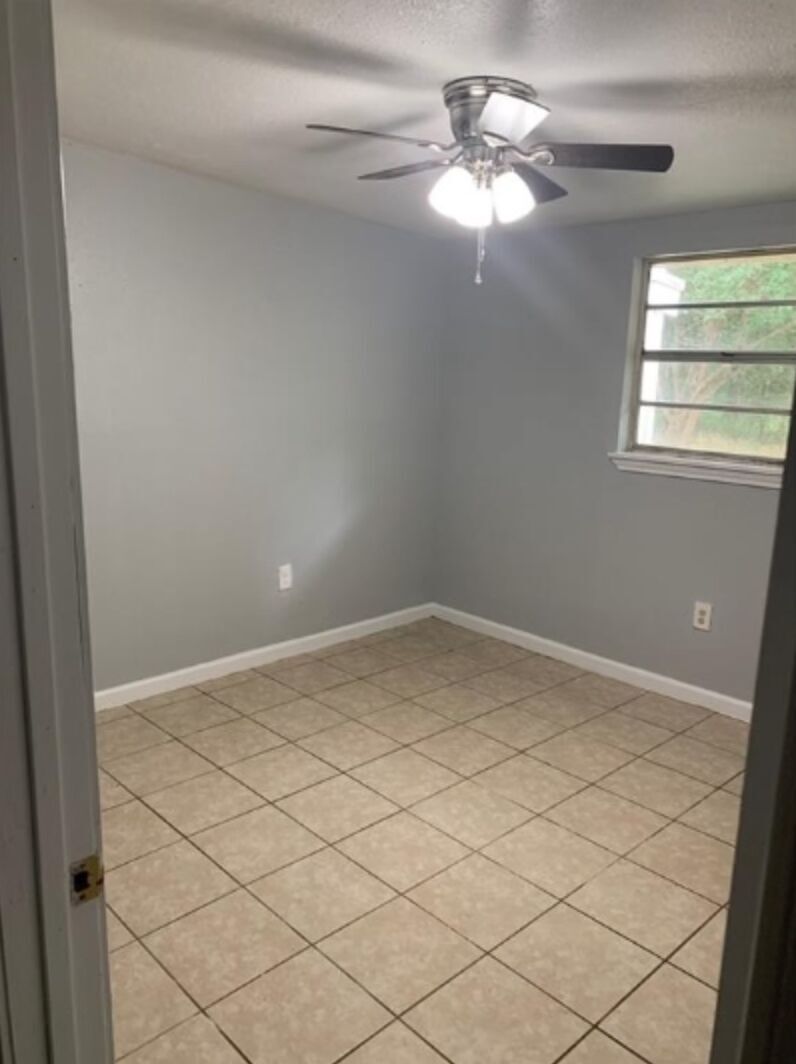 1013 Hackberry Street, Unit B San Marcos, TX 78666 - Photo 6 of 9 a view of a window in an empty room