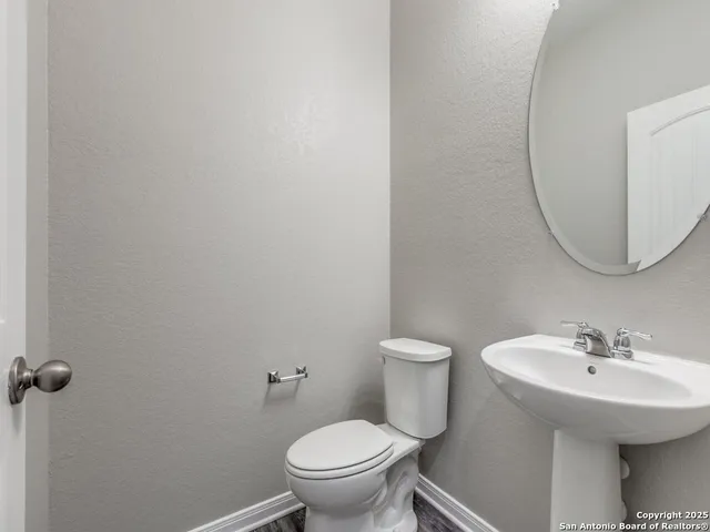 a bathroom with a sink and a toilet