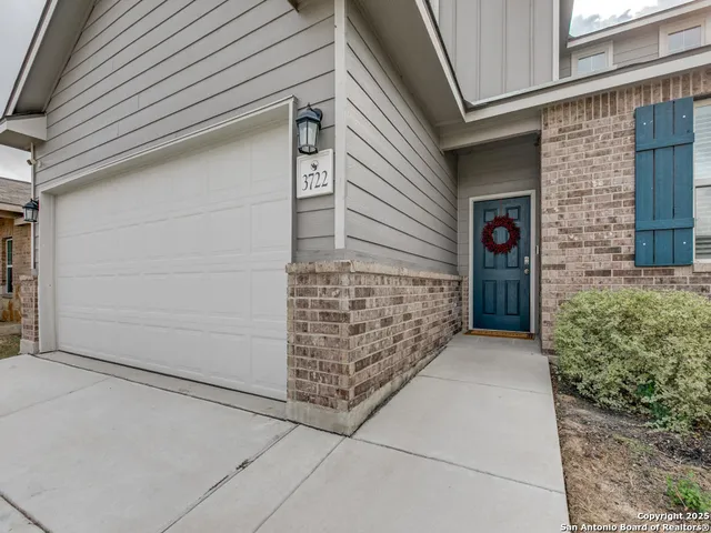 a view of front door and wooden door