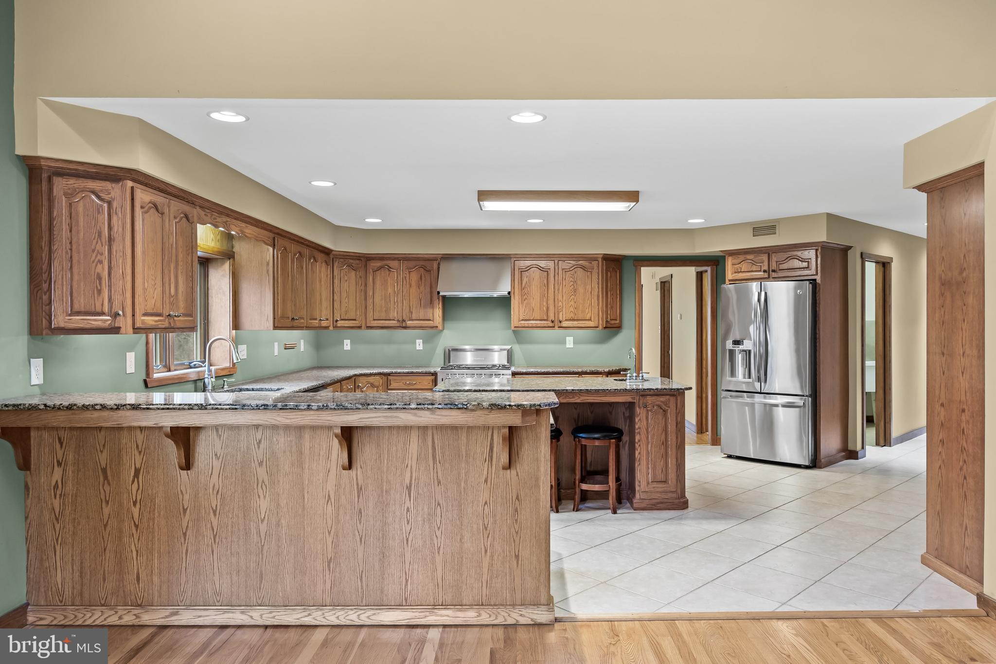3259 Union Road Vineland, NJ 08361 - Photo 30 of 81 a kitchen with stainless steel appliances granite countertop a stove a sink dishwasher and a refrigerator