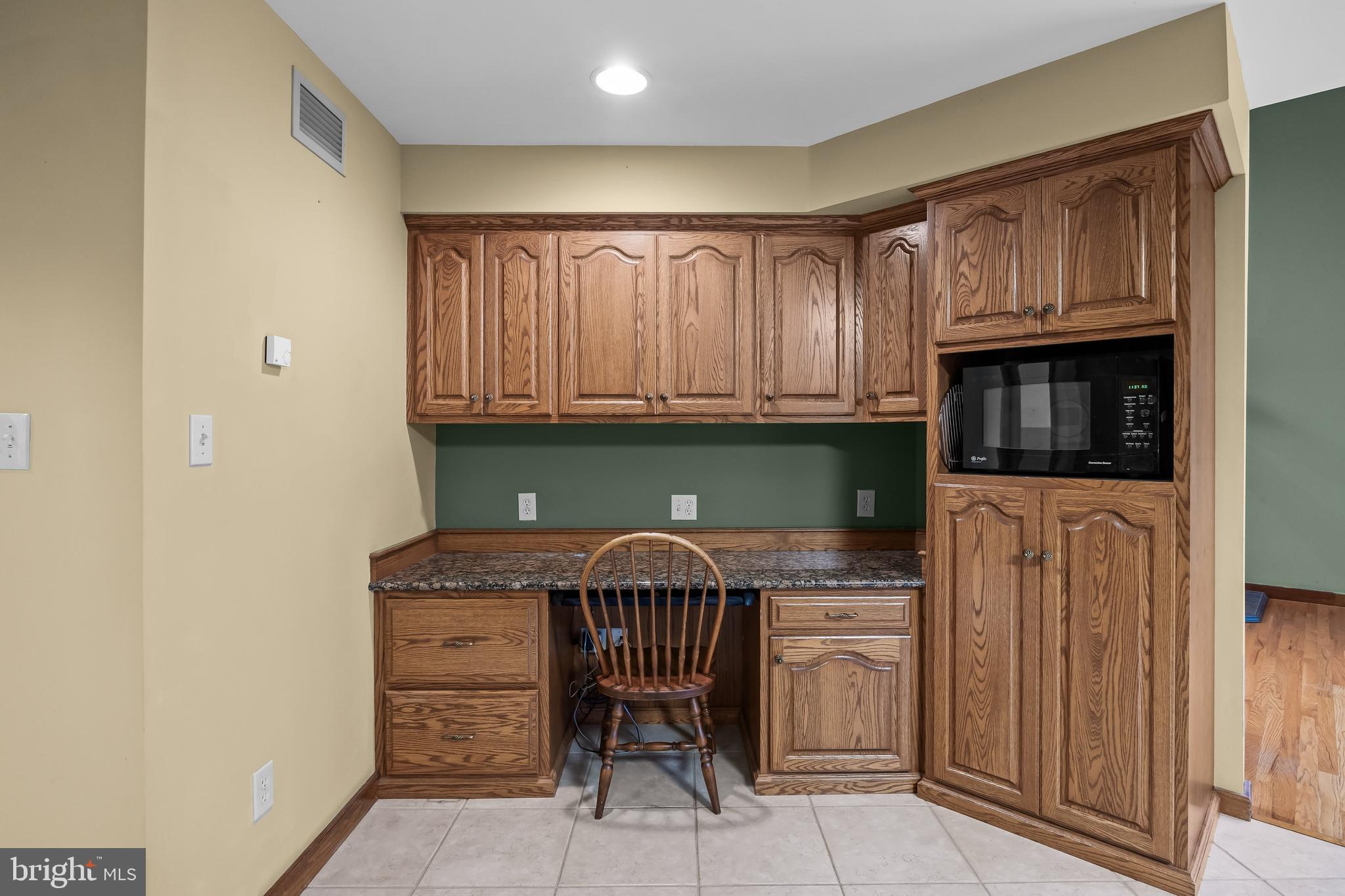 3259 Union Road Vineland, NJ 08361 - Photo 37 of 81 a kitchen with granite countertop wood cabinets stainless steel appliances and a sink