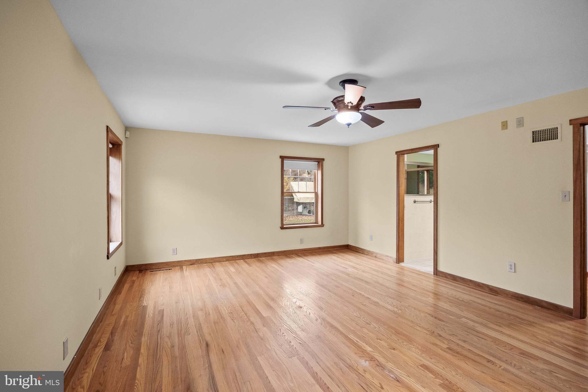 3259 Union Road Vineland, NJ 08361 - Photo 39 of 81 wooden floor in an empty room with a window