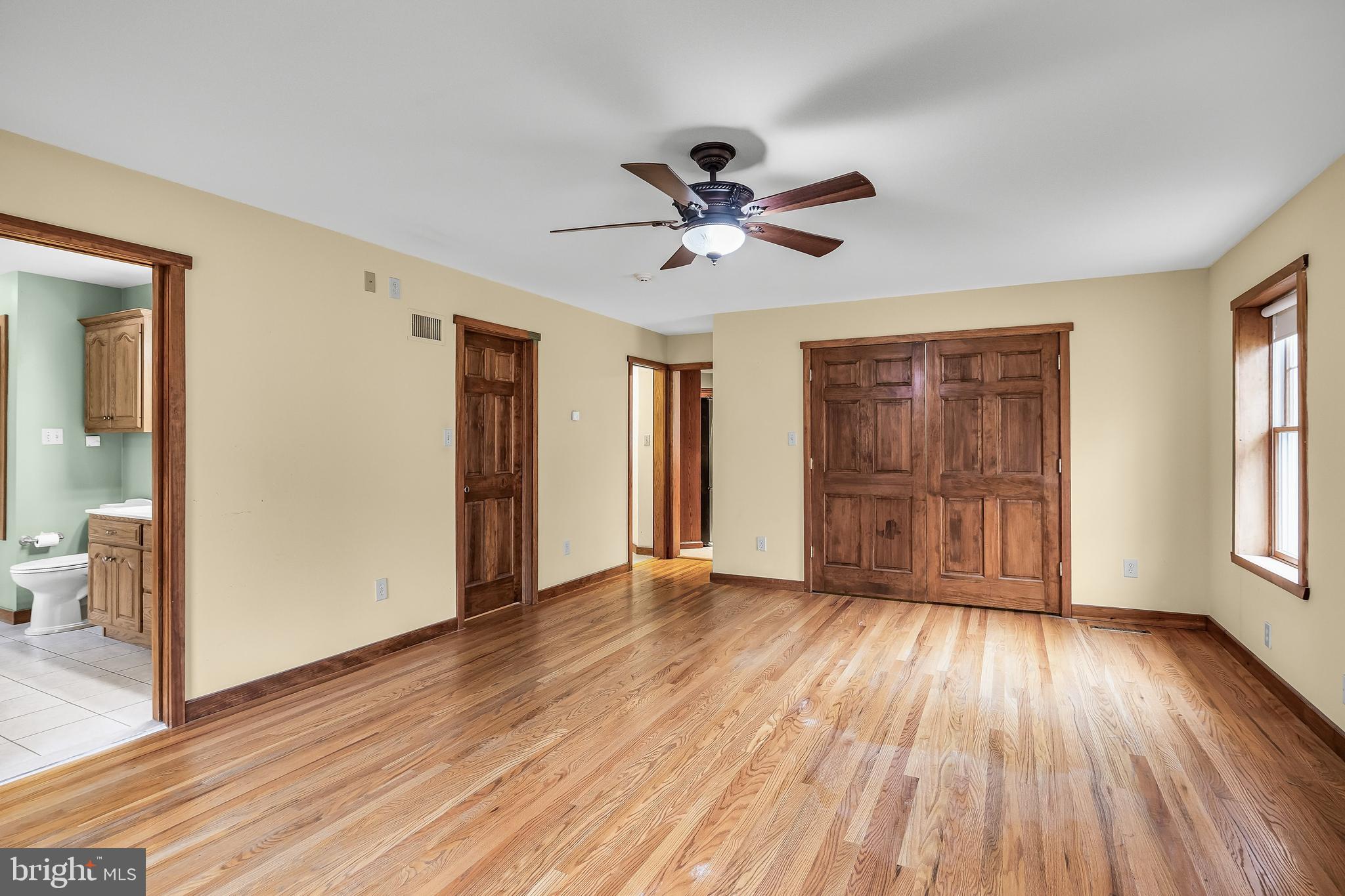 3259 Union Road Vineland, NJ 08361 - Photo 40 of 81 a view of empty room with wooden floor and fan
