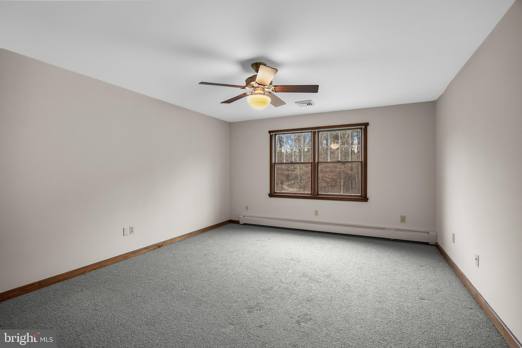 3259 Union Road Vineland, NJ 08361 - Photo 50 of 81 an empty room with chandelier fan and windows