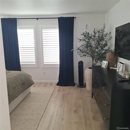 a view of a a dining table and chairs in the kitchen