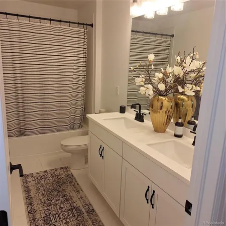 a bed room with a bed and a window