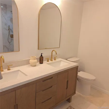 a view of a terrace with white bench