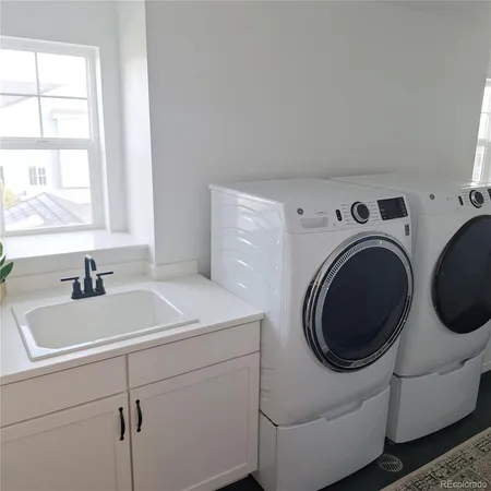 a view of electric room and utility room