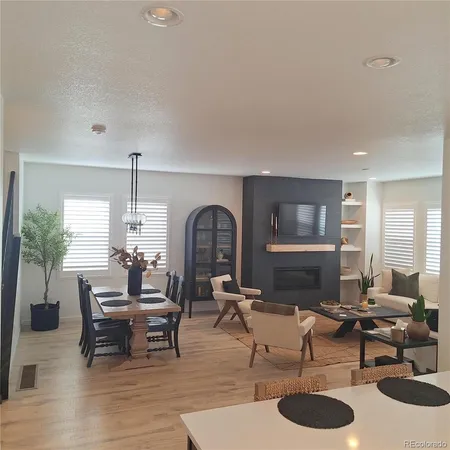 a kitchen with a sink appliances and cabinets