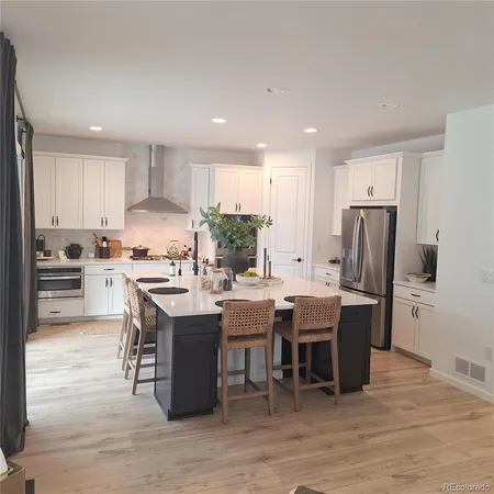 a view of walk in closet with living room