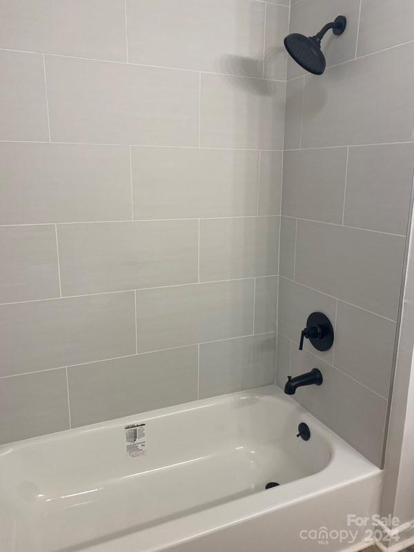 181 Spring Garden Avenue Kannapolis, NC 28081 - Photo 17 of 30 a bathroom with a bathtub