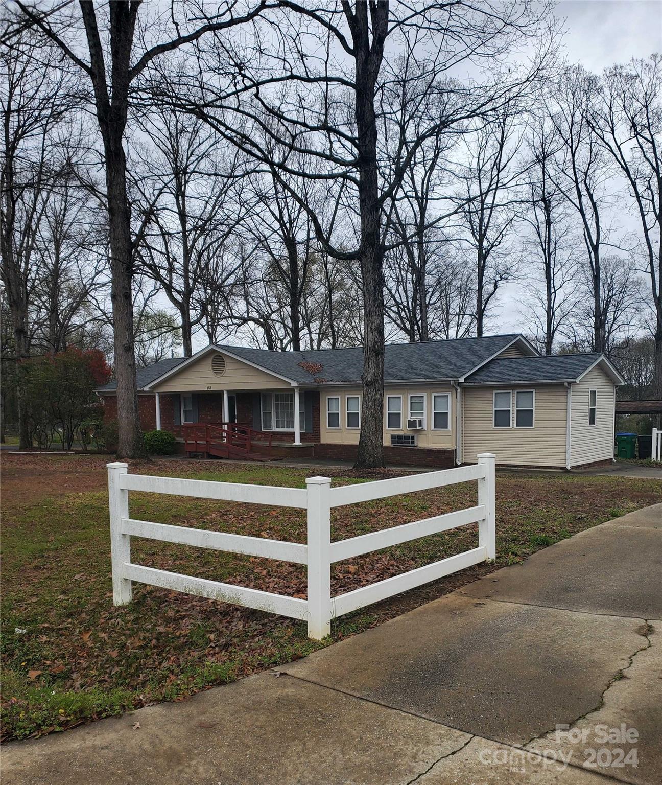 181 Spring Garden Avenue Kannapolis, NC 28081 - Photo 2 of 30 a front view of a house with a yard