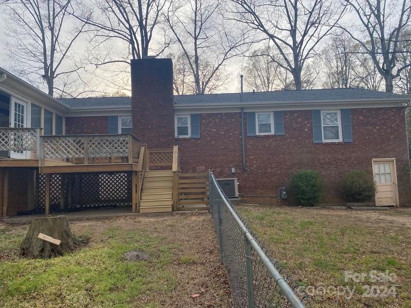 181 Spring Garden Avenue Kannapolis, NC 28081 - Photo 24 of 30 a view of a house with a yard