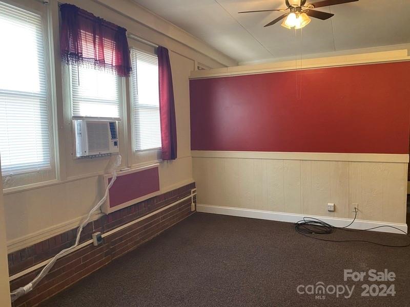 181 Spring Garden Avenue Kannapolis, NC 28081 - Photo 27 of 30 an empty room with a window
