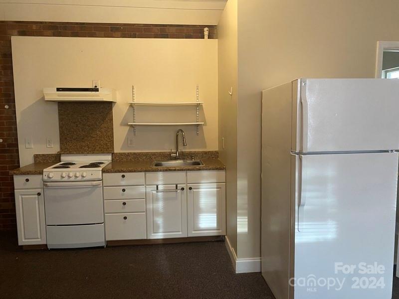 181 Spring Garden Avenue Kannapolis, NC 28081 - Photo 28 of 30 a room with storage and utility