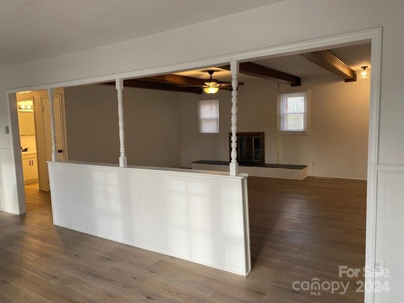 181 Spring Garden Avenue Kannapolis, NC 28081 - Photo 4 of 30 a view of empty room with wooden floor