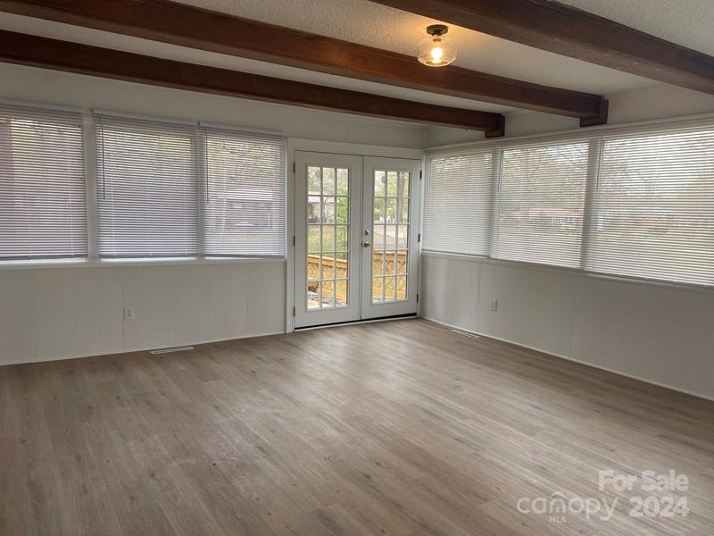 181 Spring Garden Avenue Kannapolis, NC 28081 - Photo 10 of 30 a view of an empty room with a window