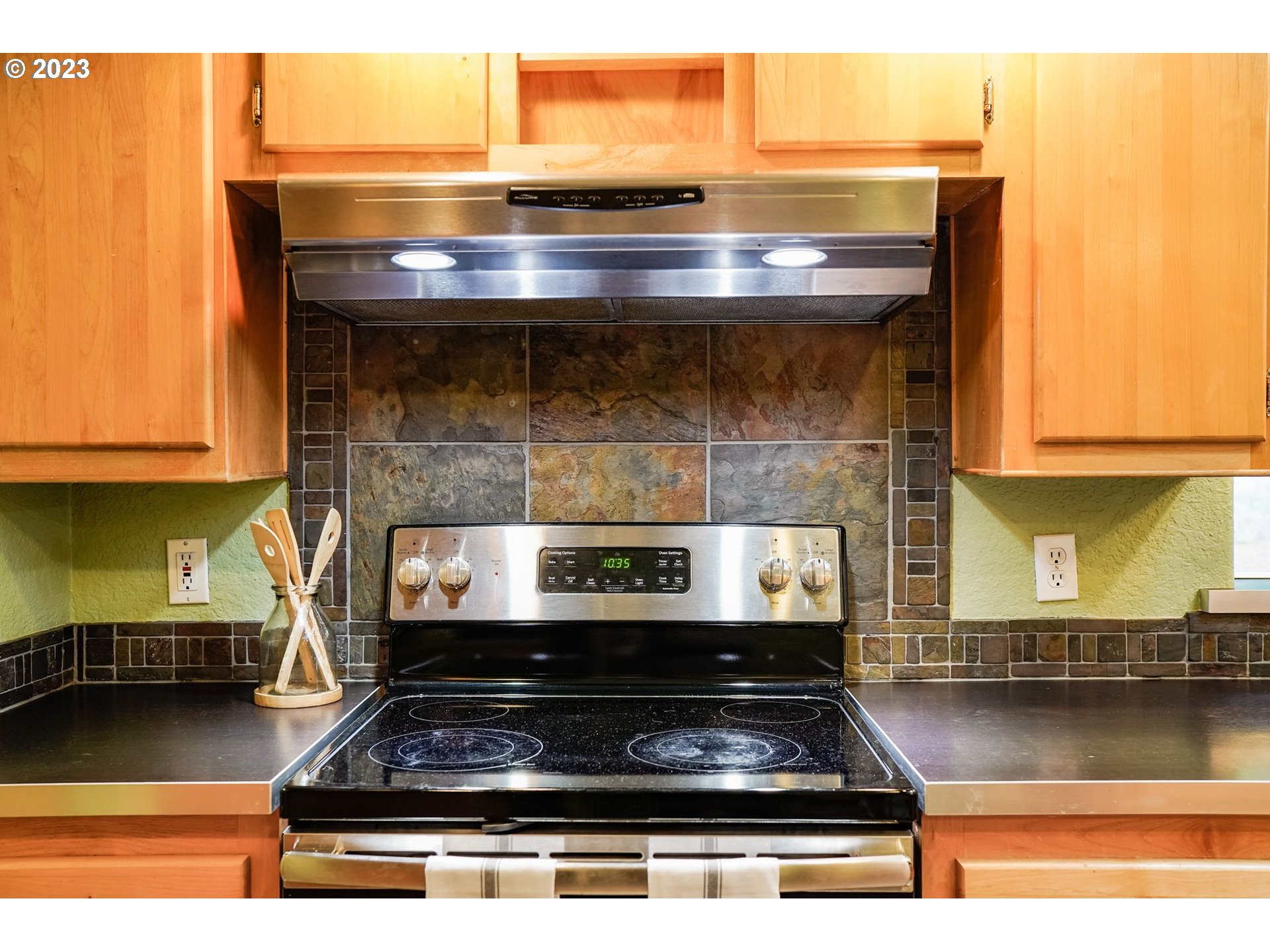 2242 East Loop Road Stevenson, WA 98648 - Photo 18 of 48 a stove top oven sitting inside of a kitchen