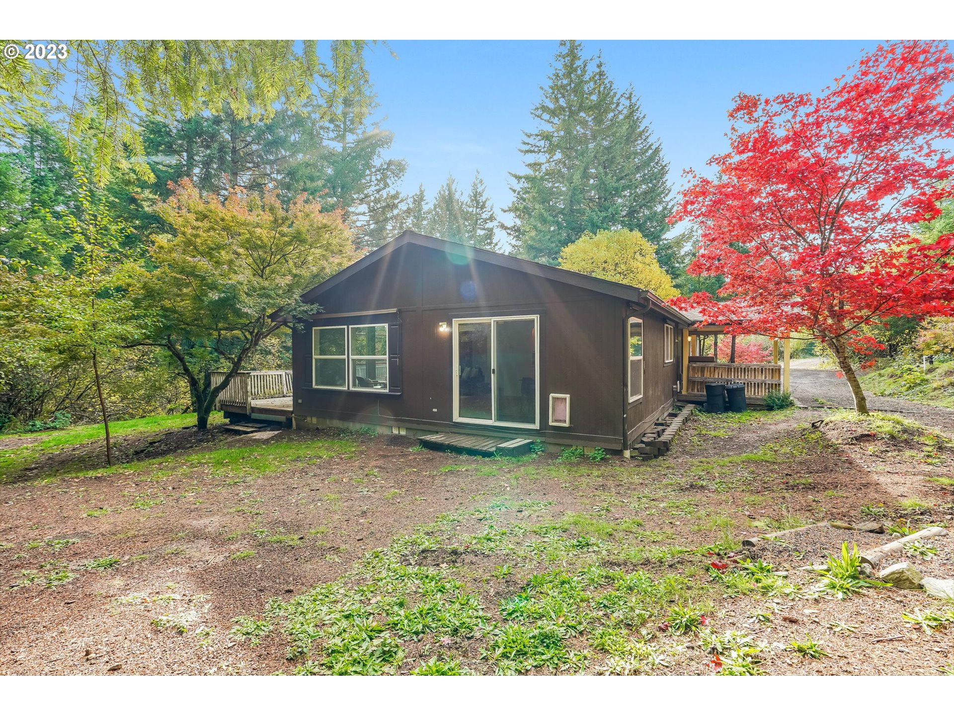 2242 East Loop Road Stevenson, WA 98648 - Photo 32 of 48 a view of a house with a yard