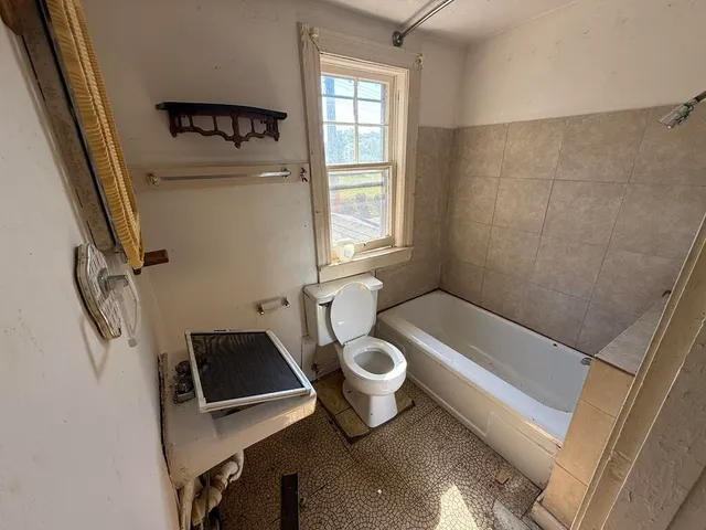 a bathroom with a sink and a bathtub