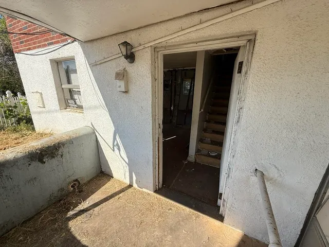 front view of a house with stairs