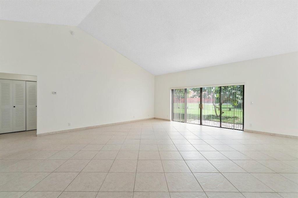 9398 Laurel Green Drive Boynton Beach, FL 33437 - Photo 3 of 19 an empty room with windows