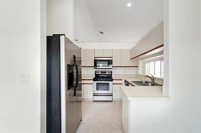 a sign on the side of the house