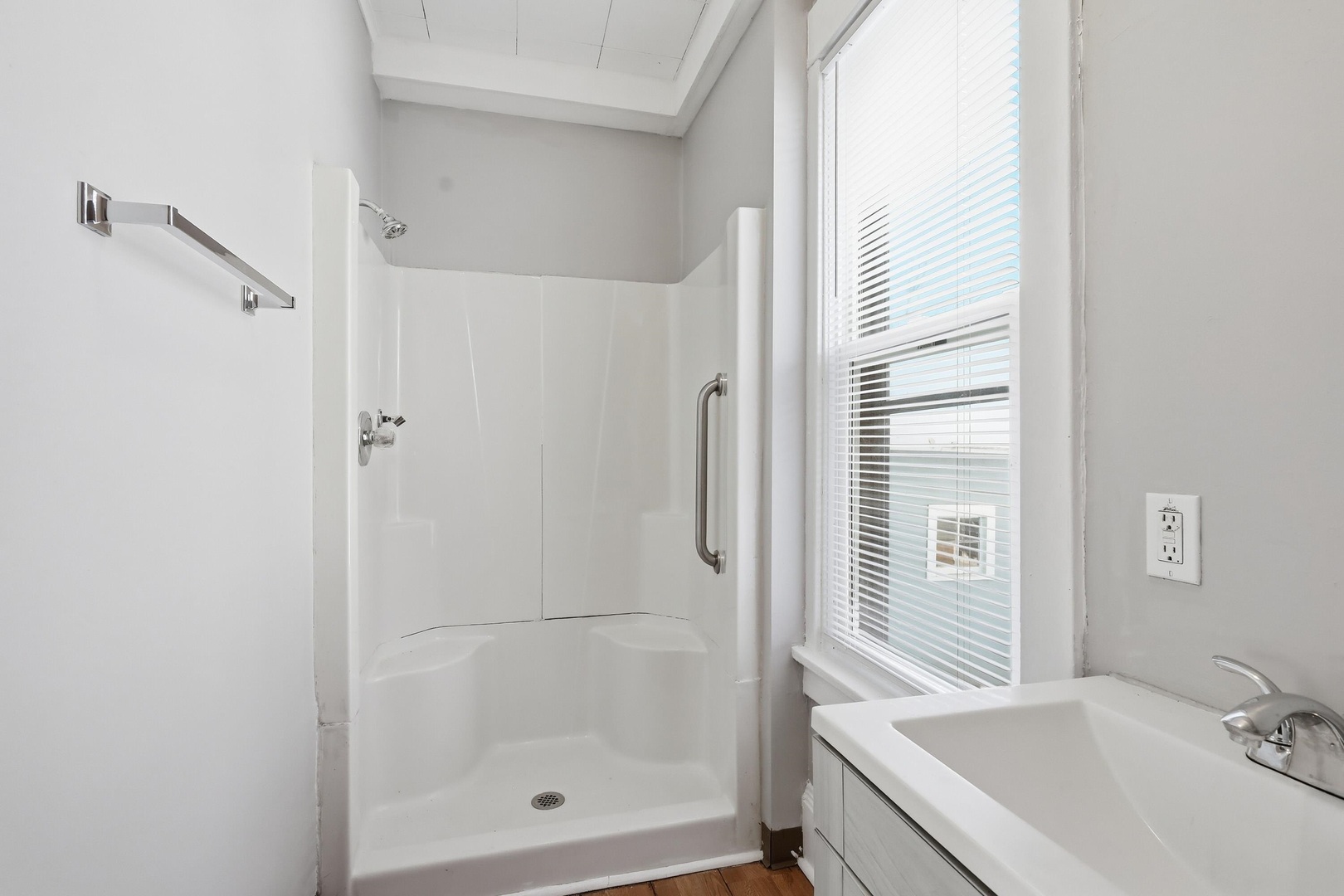 1169 23rd Street Moline, IL 61265 - Photo 10 of 20 a bathroom with a tub shower and sink