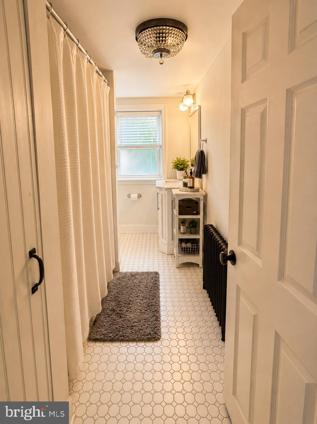 22 Balligomingo Road Conshohocken, PA 19428 - Photo 18 of 35 a bathroom with a sink and a mirror