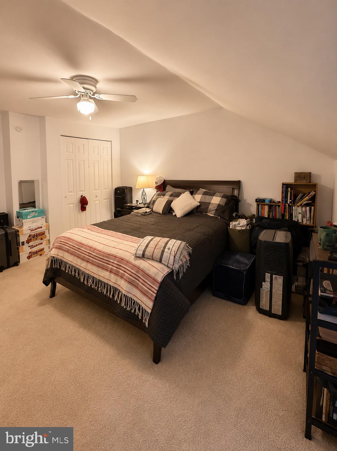 22 Balligomingo Road Conshohocken, PA 19428 - Photo 27 of 35 a spacious bedroom with a bed and furniture