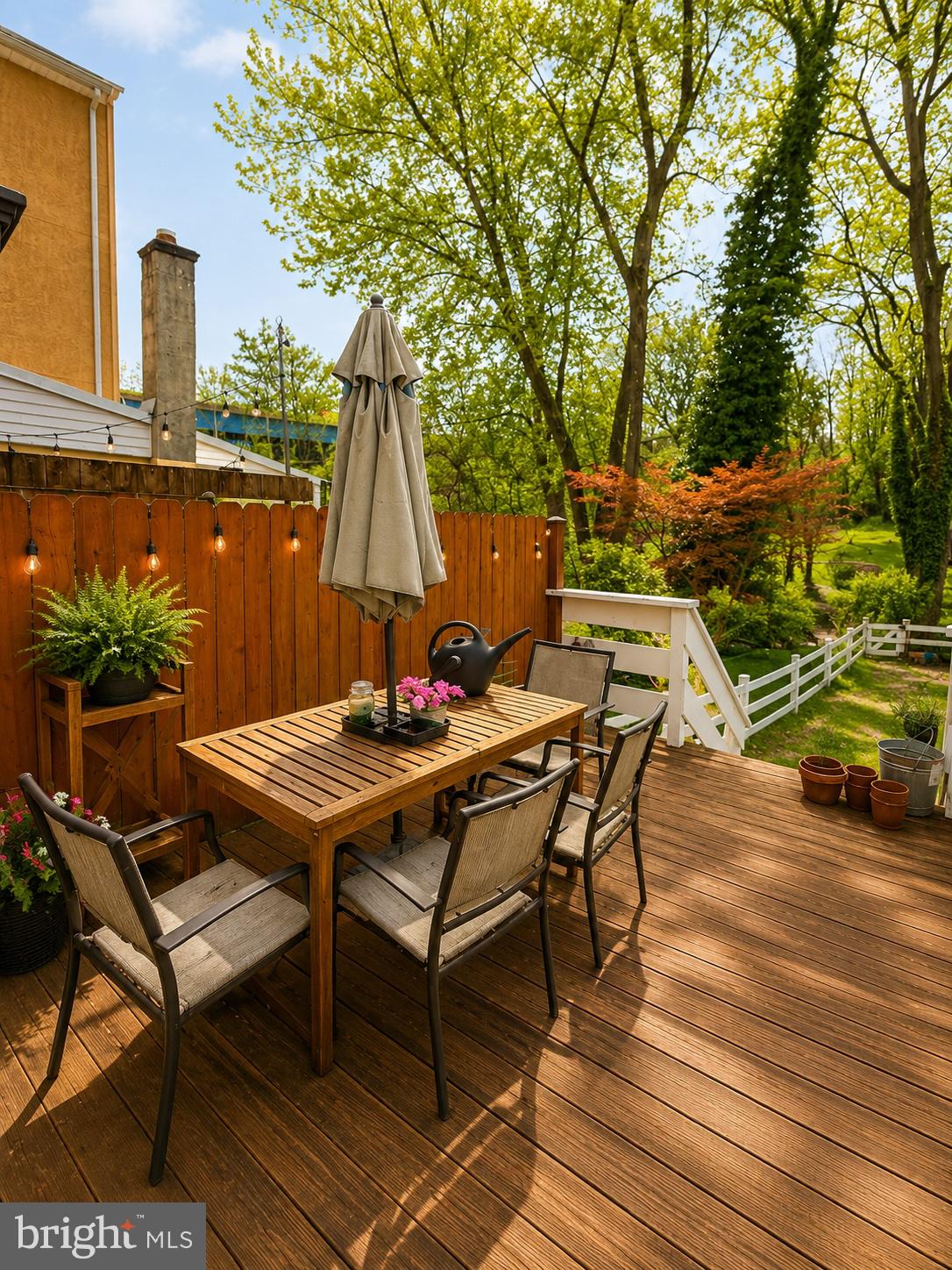22 Balligomingo Road Conshohocken, PA 19428 - Photo 34 of 35 a view of a backyard with furniture and a garden