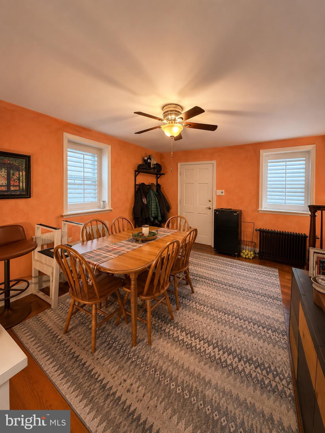 22 Balligomingo Road Conshohocken, PA 19428 - Photo 4 of 35 a dining room with furniture a rug and a chandelier