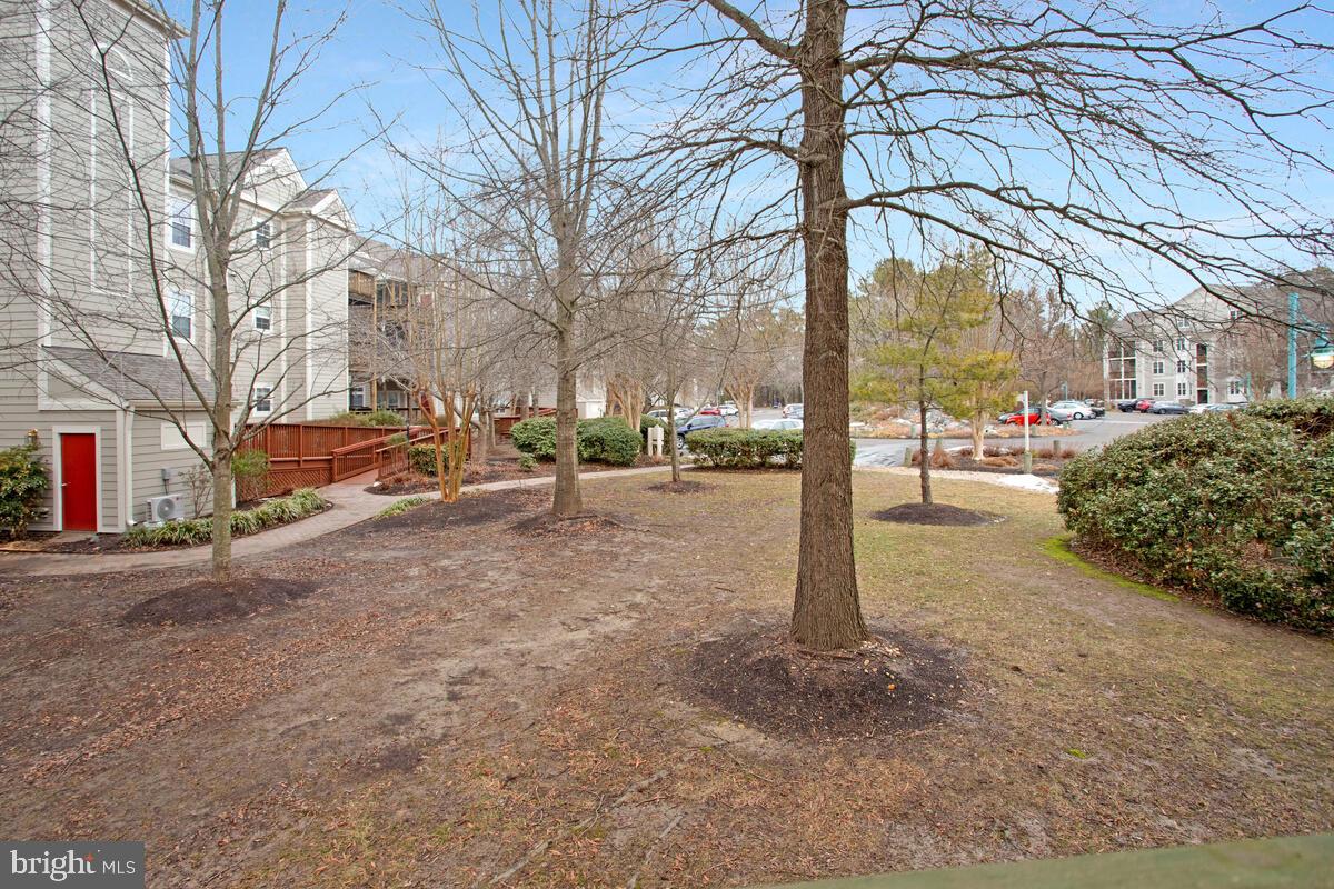 501 Runabout Loop, Unit 501 Solomons, MD 20688 - Photo 34 of 36 a street view with residential house