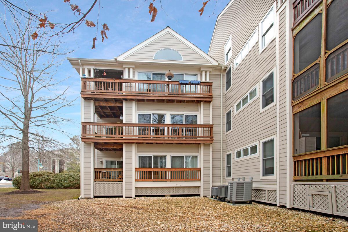 501 Runabout Loop, Unit 501 Solomons, MD 20688 - Photo 35 of 36 a view of a large white building
