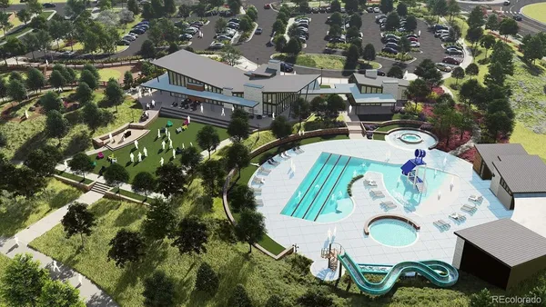 an aerial view of residential house with outdoor space and swimming pool