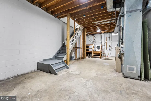 a view of stairs and furniture