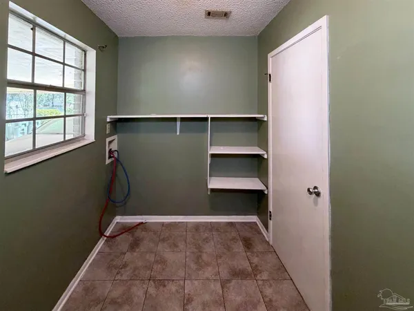 a view of room with walk in closet