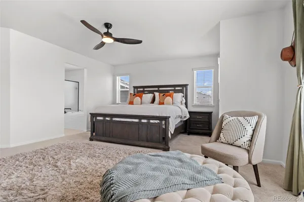 a bedroom with furniture and a bed