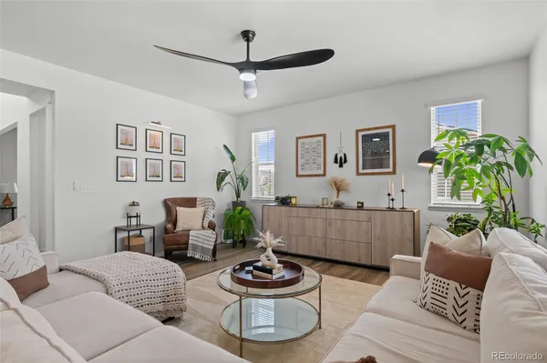 a living room with furniture and a window