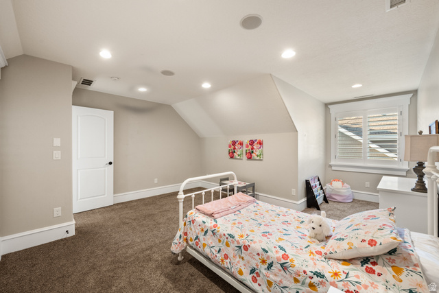 1205 North Elk Rdg Lane, Unit 202 Alpine, UT 84004 - Photo 59 of 88 Carpeted interior room featuring a white paneled door, recessed ceiling lighting, and a window with plantation shutters