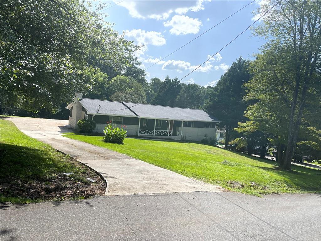 176 Towler Road Lawrenceville, GA 30046 - Photo 1 of 1 a view of a house with a yard
