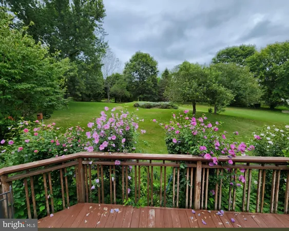 a view of a wooden fence