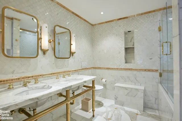 a spacious bedroom with a bed and a window