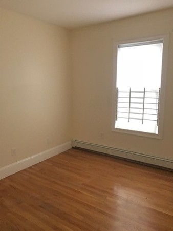 14 Schiller Street, Unit 2 Boston, MA 02130 - Photo 5 of 12 an empty room with a window