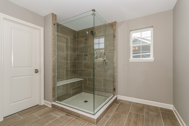 1228 Declan Court, Unit 4 Naperville, IL 60563 - Photo 21 of 32 a bathroom with a shower