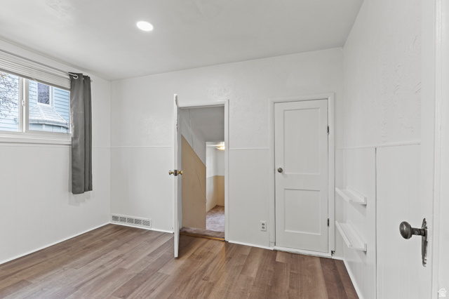 180 South 300 East Logan, UT 84321 - Photo 15 of 35 Unfurnished bedroom with vinyl floors and recessed lighting