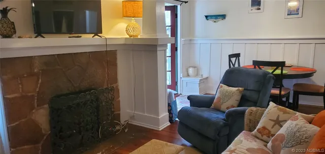 a living room with furniture and a window